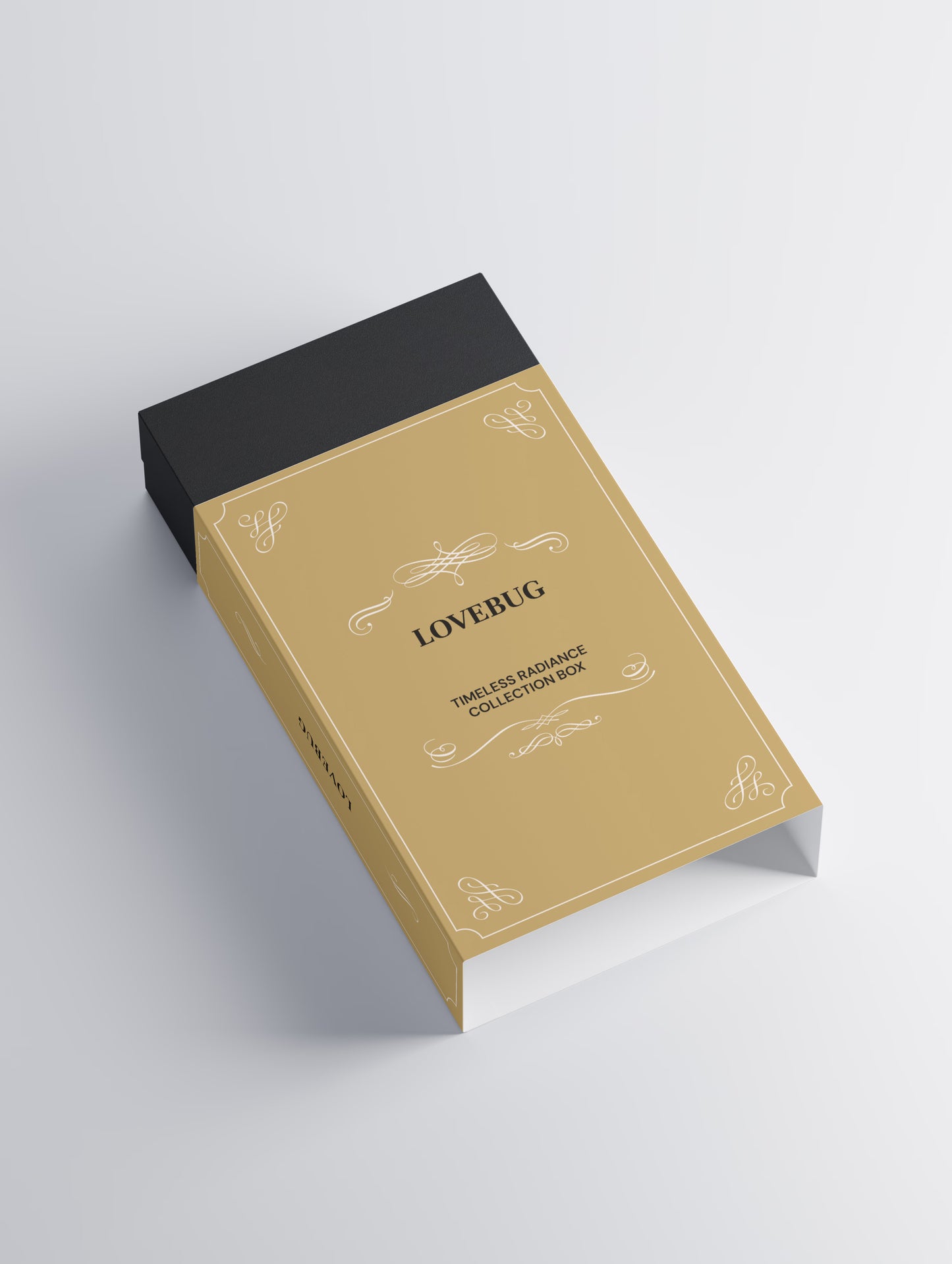 LOVEBUG Timeless Radiance Collection Box in gold, angled view